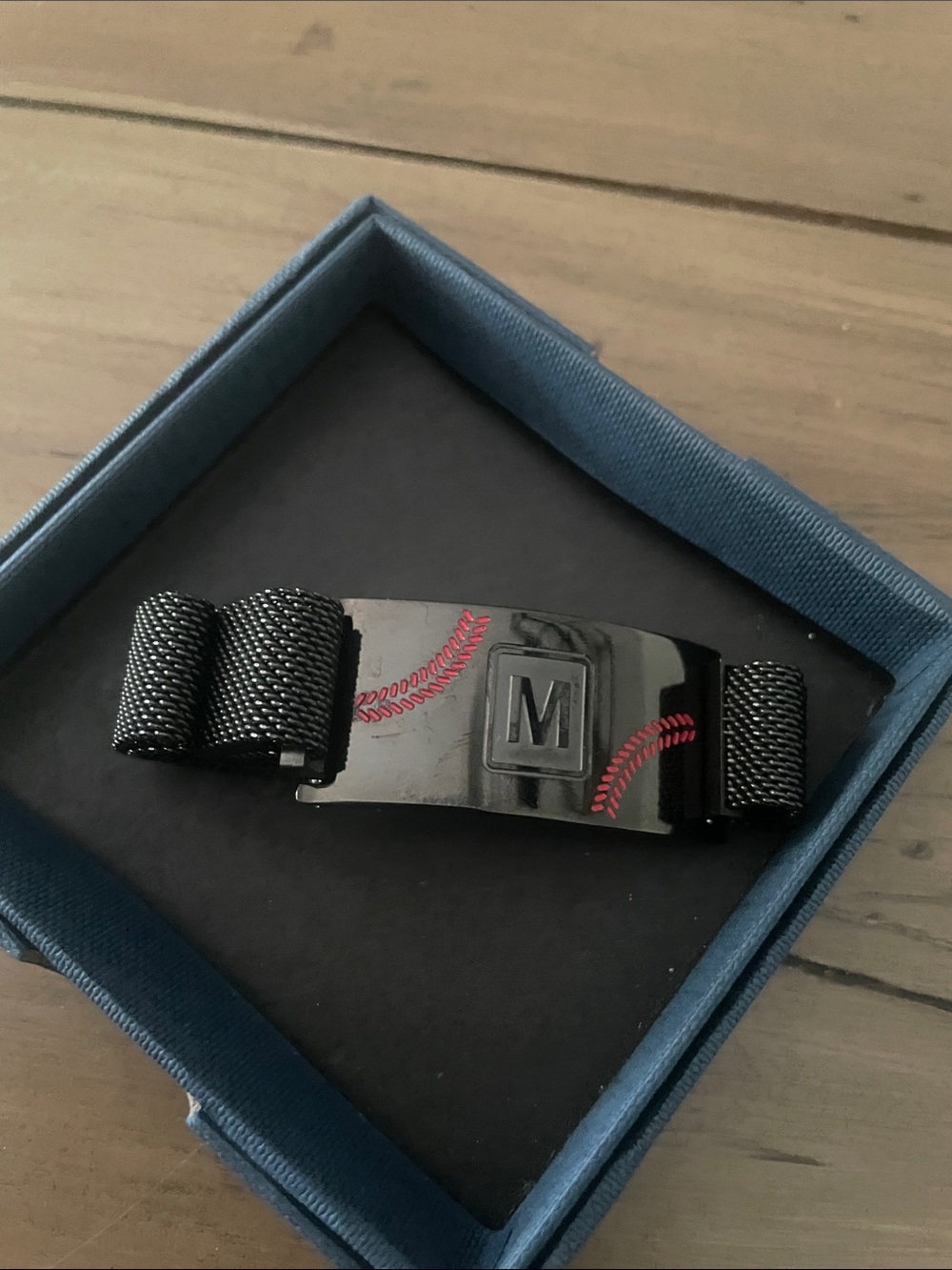 Initial Black esh Bracelet with Red Stitch Detail